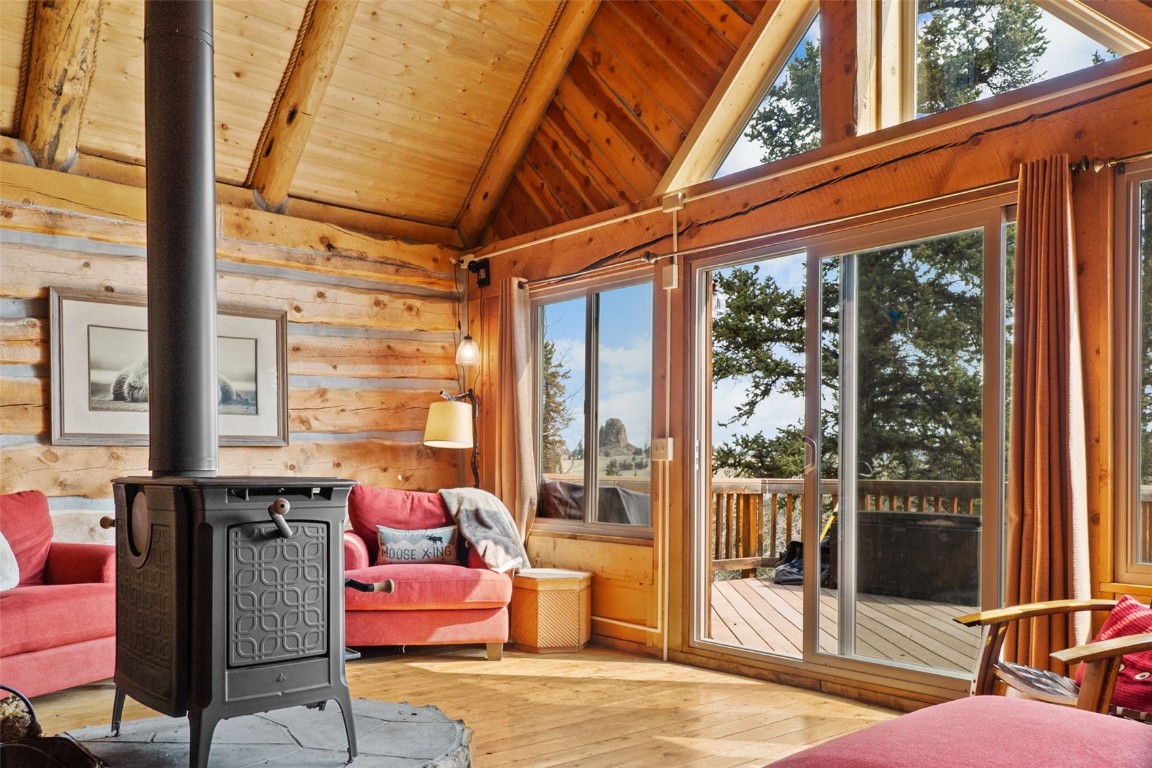 245 Bronco Circle Como, CO 80456 - Photo 15 of 40 a bedroom with furniture and large windows