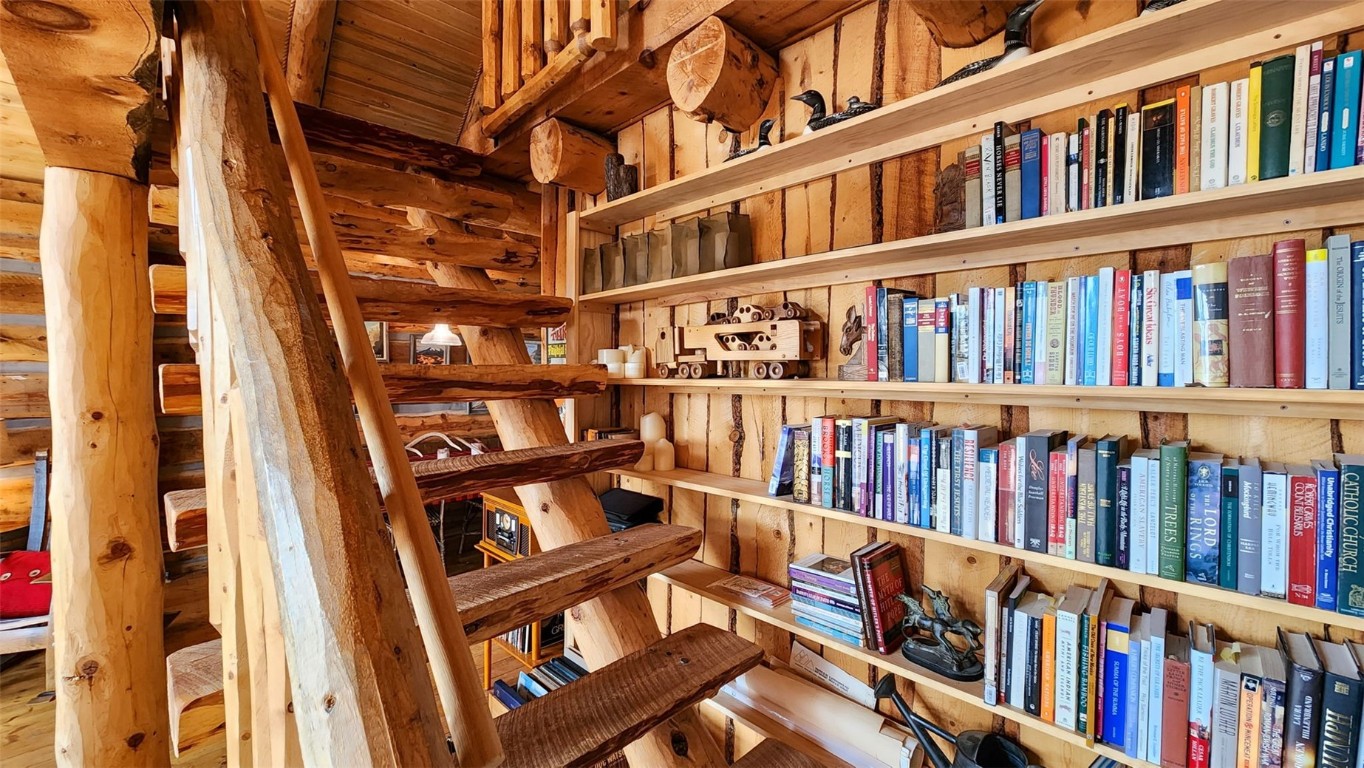 245 Bronco Circle Como, CO 80456 - Photo 26 of 40 a book shelf with lots of books