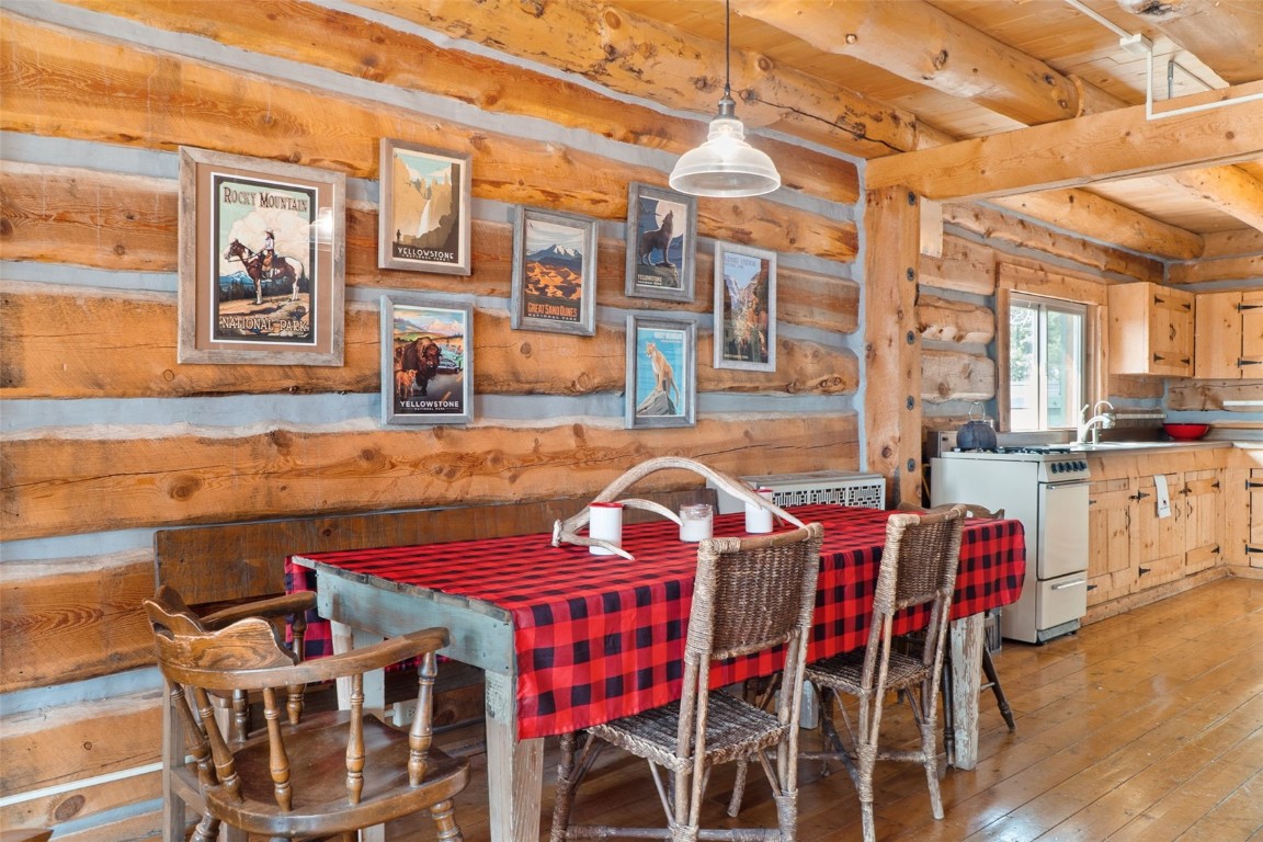 245 Bronco Circle Como, CO 80456 - Photo 8 of 40 a view of a dining room with furniture and chandelier