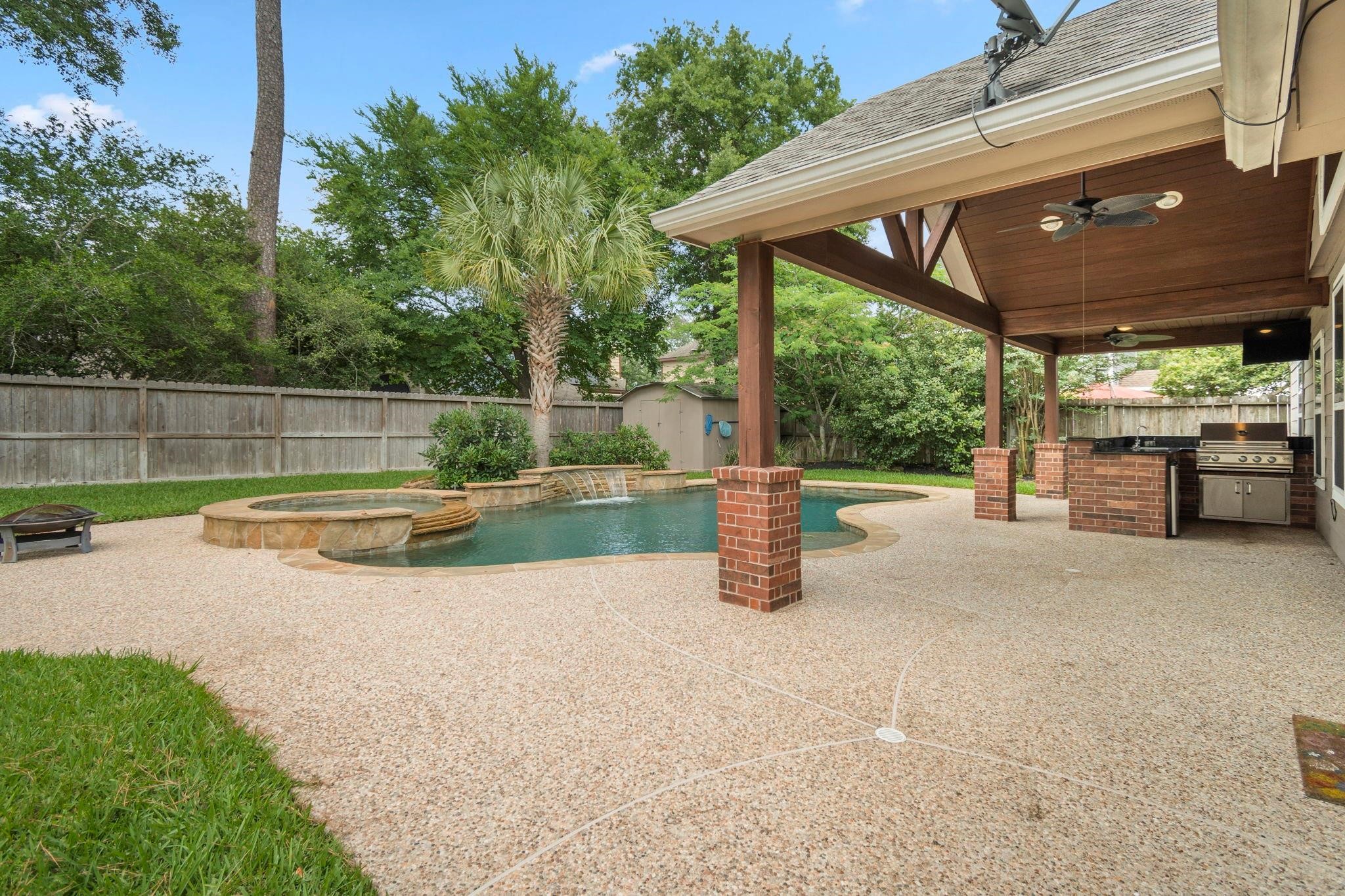 1927 Enchanted Park Drive Spring, TX 77386 - Photo 5 of 11 a view of a chairs and table in the patio