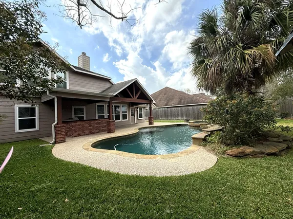 a view of house with outdoor space