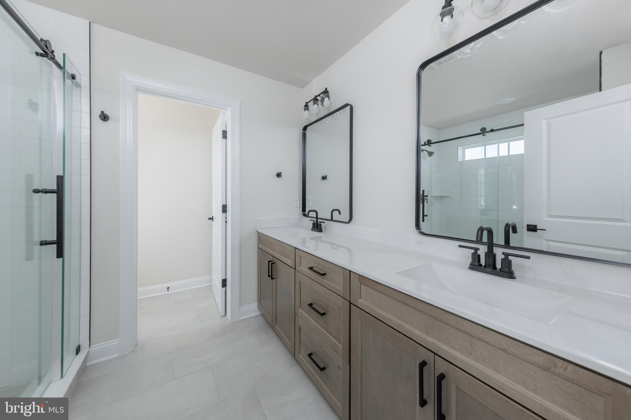 37 Whiskey Mill Road Clarksboro, NJ 08020 - Photo 20 of 33 a bathroom with double vanity sink and a mirror