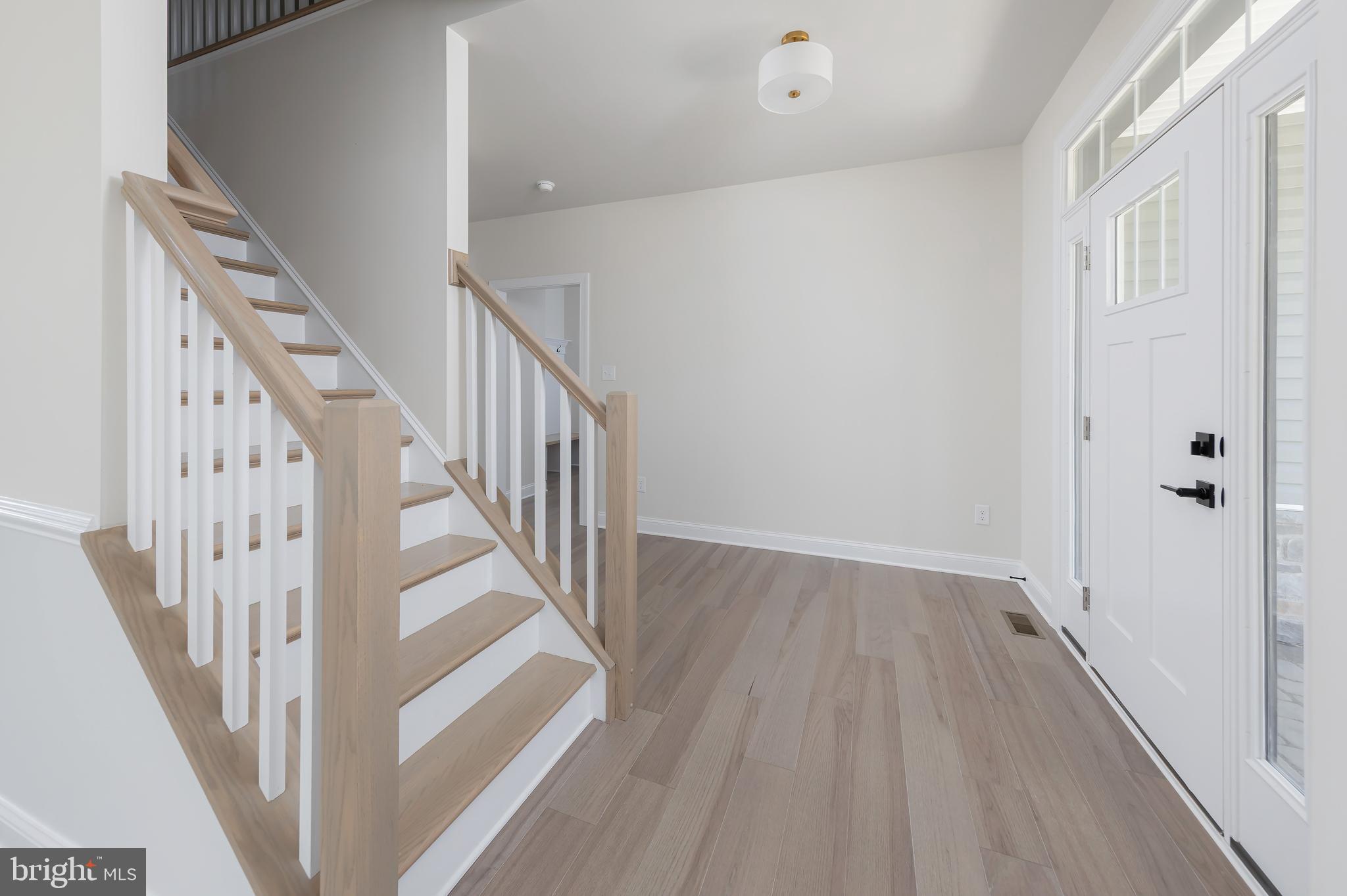 37 Whiskey Mill Road Clarksboro, NJ 08020 - Photo 6 of 33 a view of a hallway with wooden floor and entryway