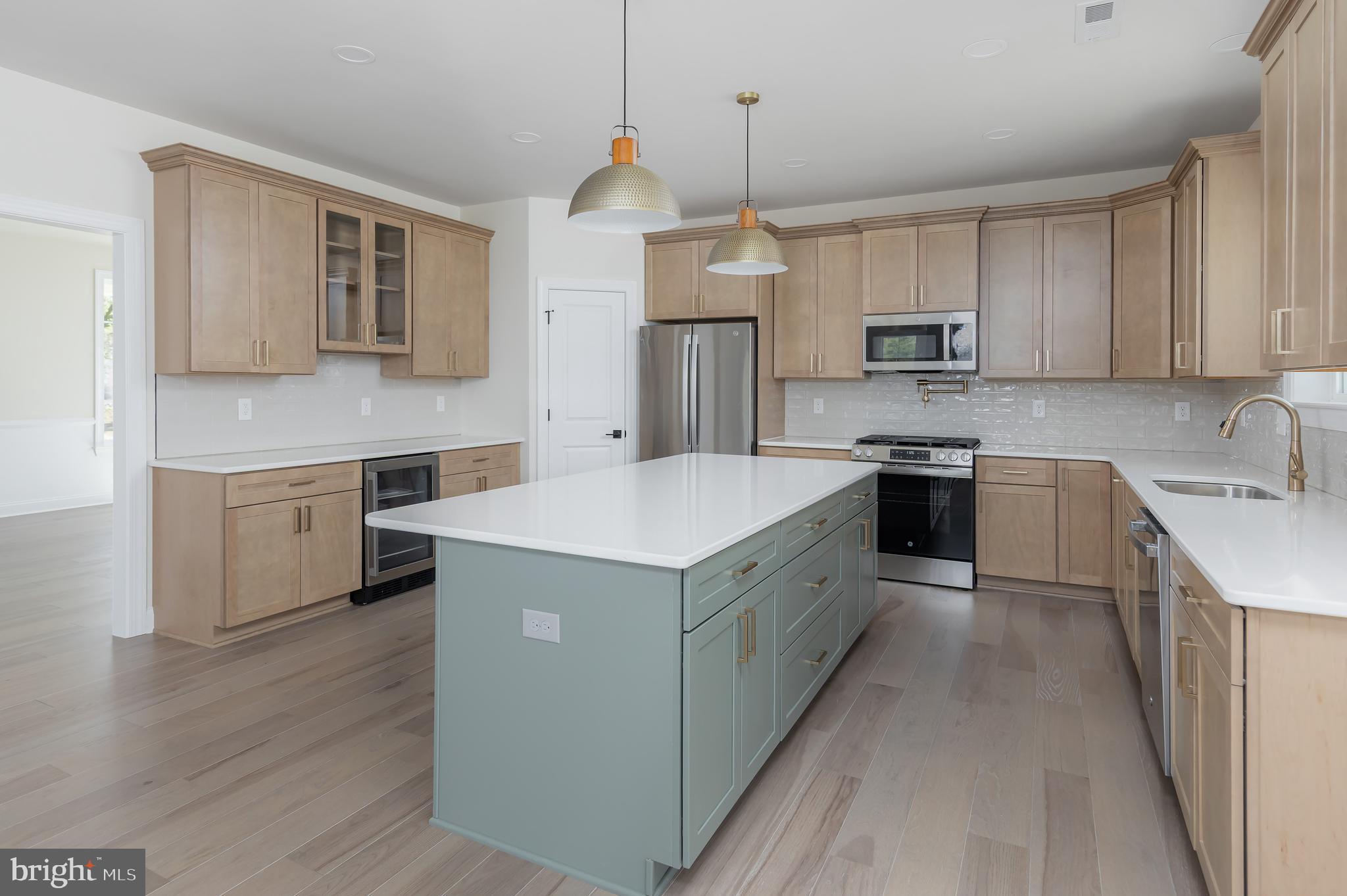 37 Whiskey Mill Road Clarksboro, NJ 08020 - Photo 10 of 33 a kitchen that has a lot of cabinets and wooden floor