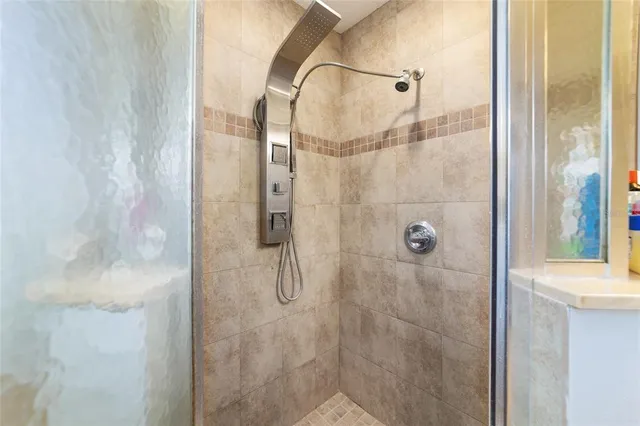 a bathroom with a sink a faucet and a mirror