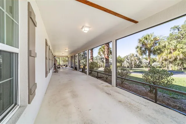 a view of a livingroom with furniture and windows