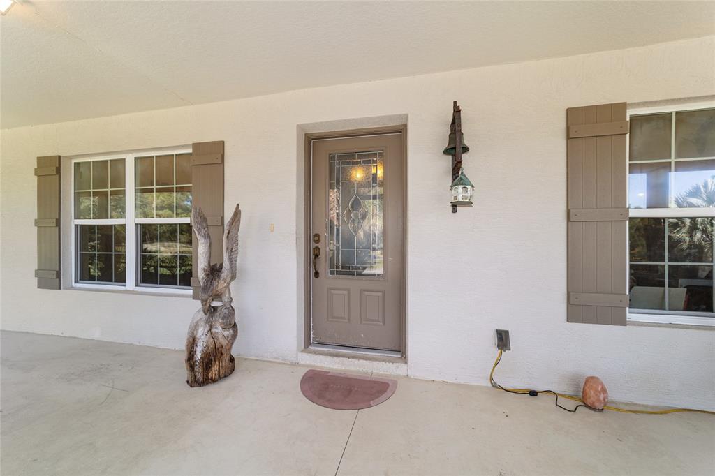 12932 Southwest 41st Place Ocala, FL 34481 - Photo 5 of 29 a view of a livingroom with furniture and windows