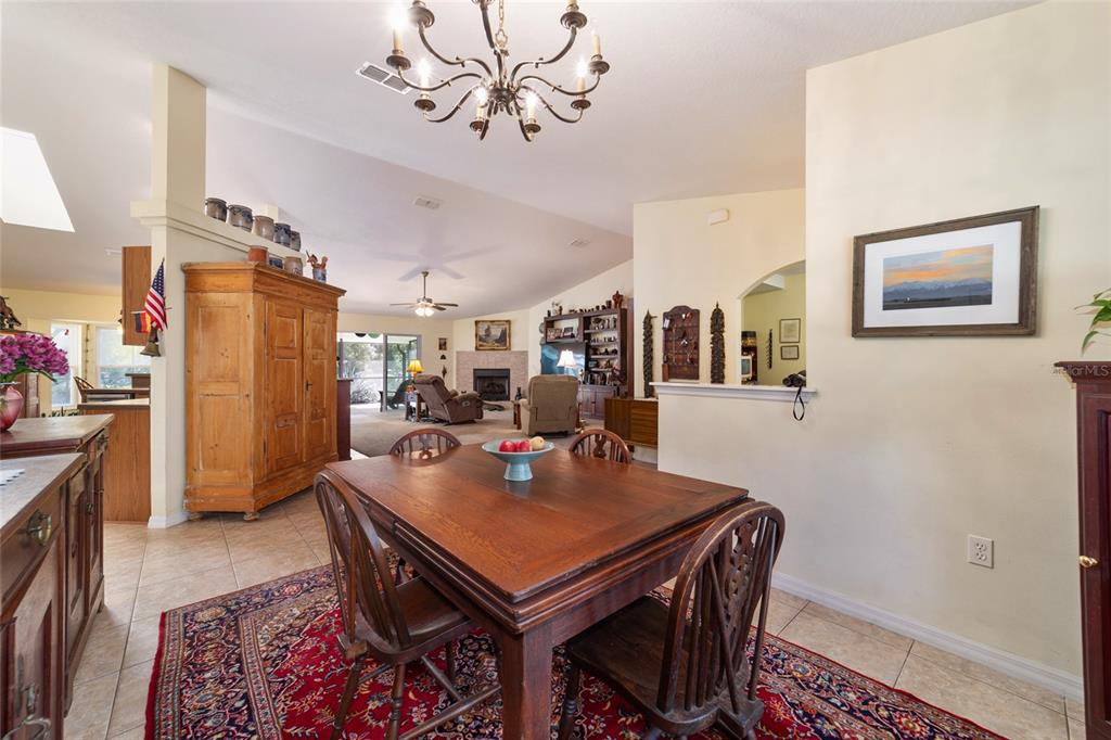 12932 Southwest 41st Place Ocala, FL 34481 - Photo 7 of 29 a view of a dining room with furniture
