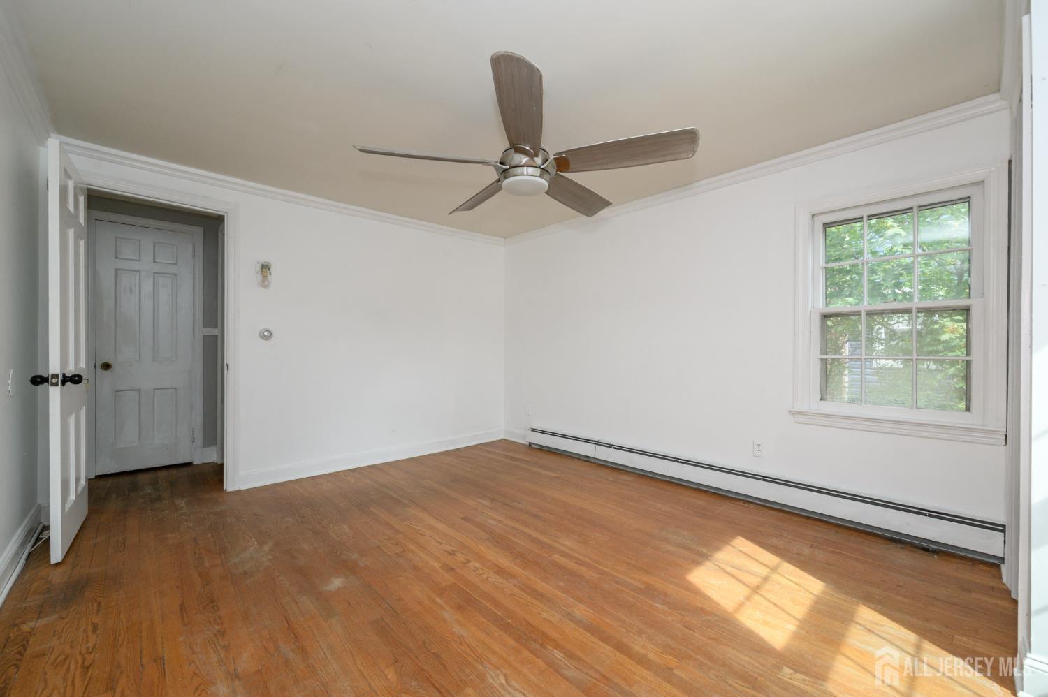 212 Echo Avenue Edison, NJ 08837 - Photo 22 of 42 a view of an empty room with a window
