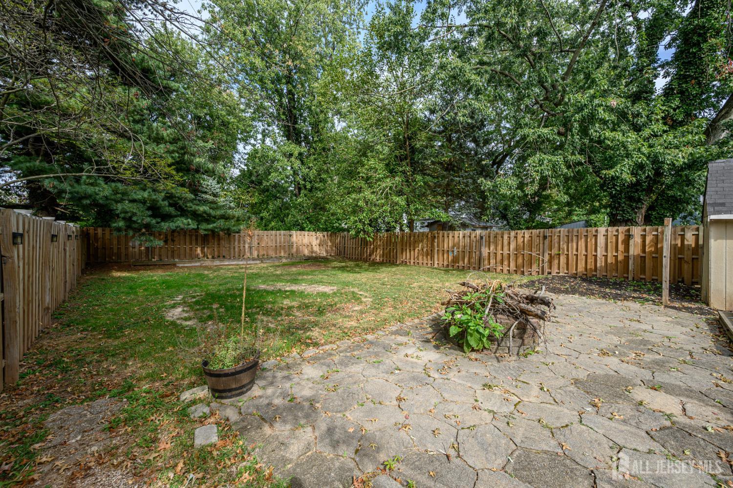 212 Echo Avenue Edison, NJ 08837 - Photo 41 of 42 a view of garden with wooden fence