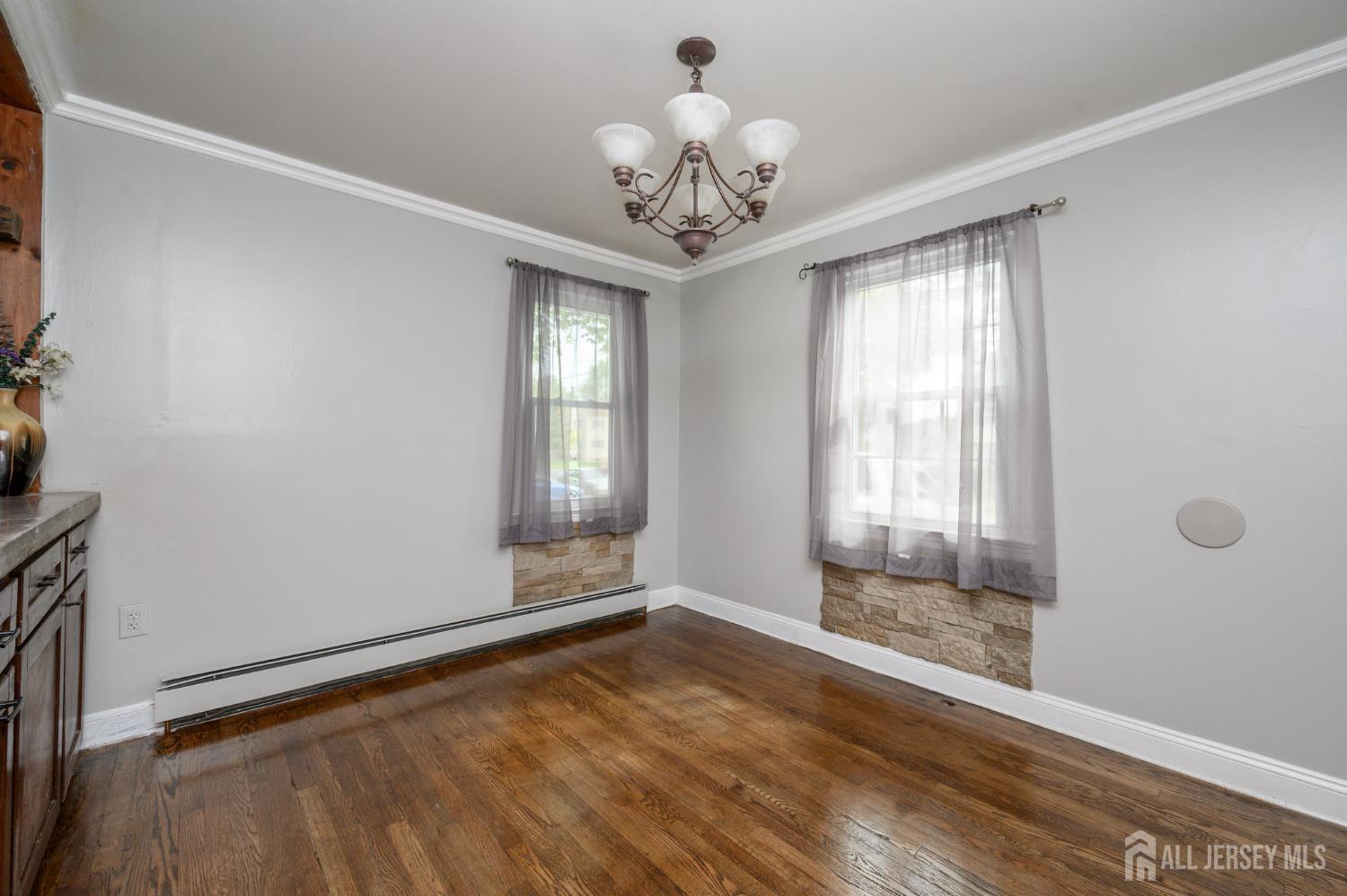 212 Echo Avenue Edison, NJ 08837 - Photo 7 of 42 a view of an empty room with a window