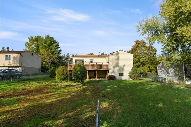 a view of a house with a big yard
