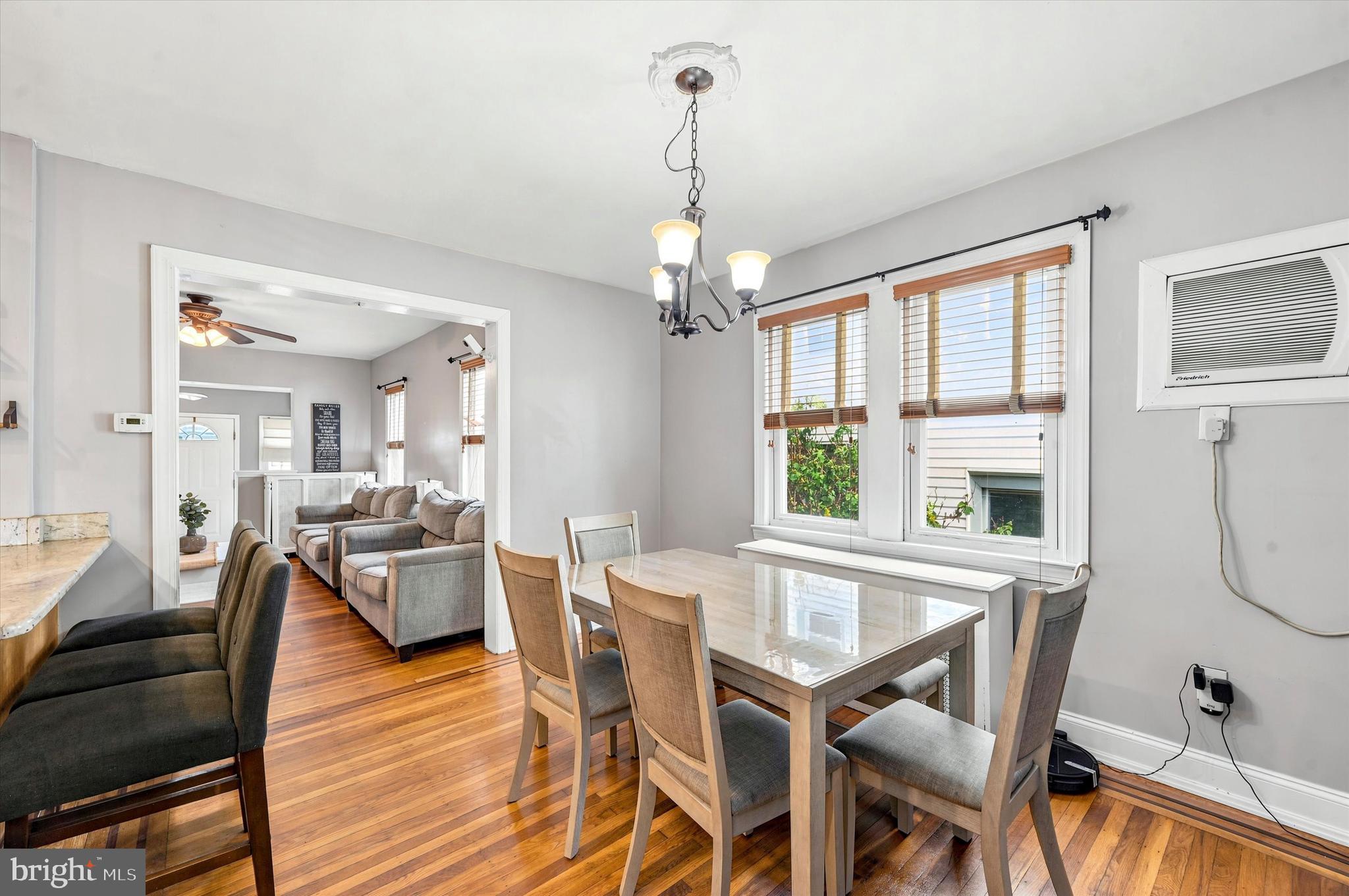 1210 Harding Drive Havertown, PA 19083 - Photo 10 of 25 a view of a dining room with furniture window and wooden floor