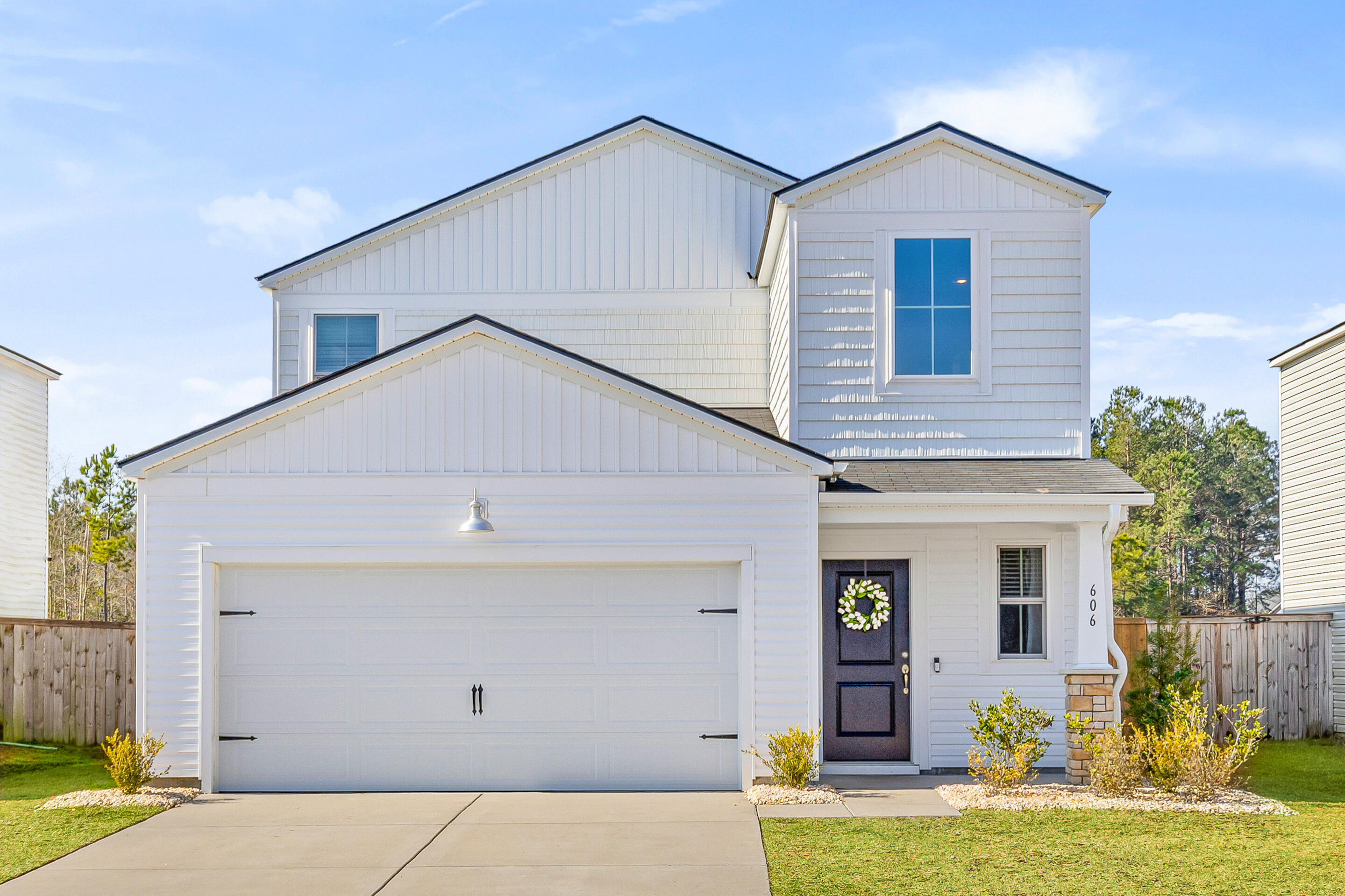 606 Spanish Wells Road Summerville, SC 29486 - Photo 1 of 31 606 SW Front Ext. Green grass