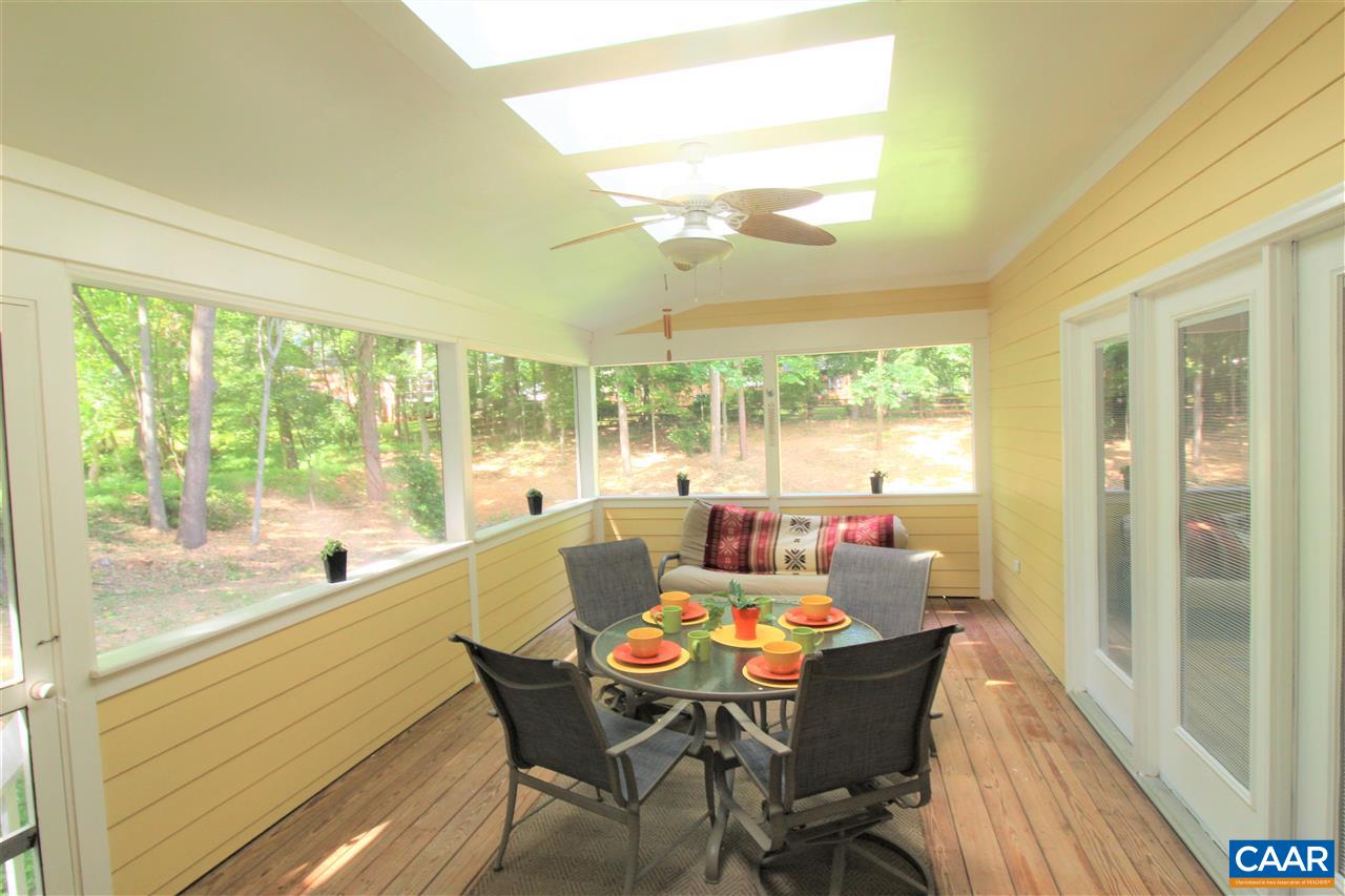 1250 Raintree Drive Charlottesville, VA 22901 - Photo 3 of 47 a view of a dining room with furniture window and outside view