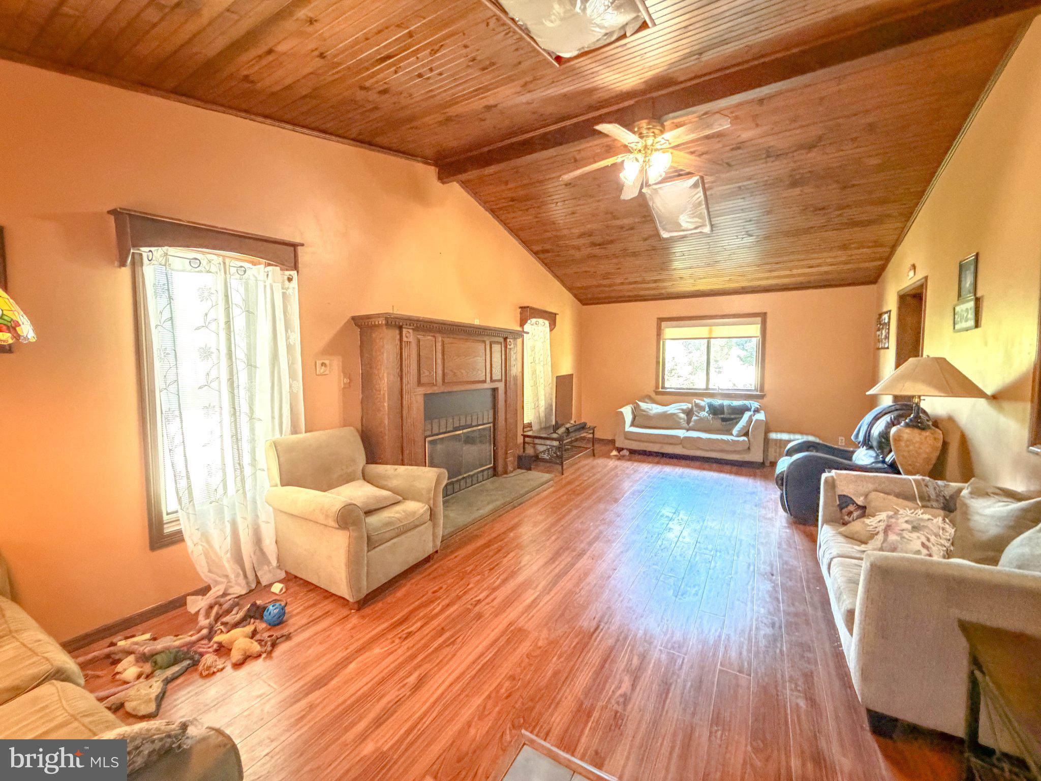 646 Amosland Road Morton, PA 19070 - Photo 2 of 11 Spacious living area with warm tones.