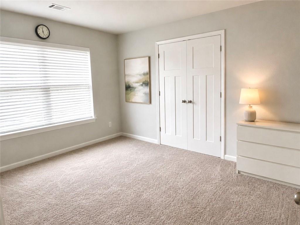 3359 Elkhorn Ridge Run Dacula, GA 30019 - Photo 26 of 35 a view of an empty room with a window