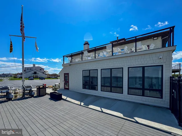 a view of a building with sitting area