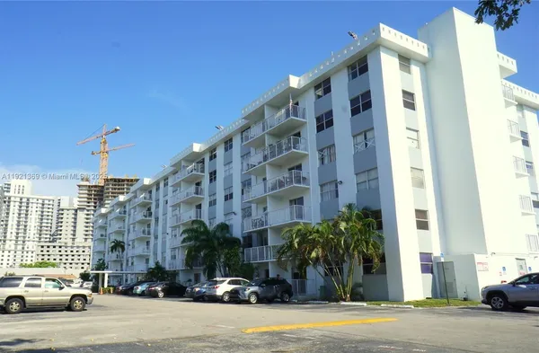 a front view of a building with street view