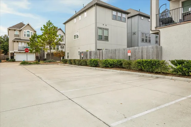a front view of a building with garden