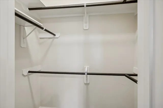 a view of a room with racks on the wall