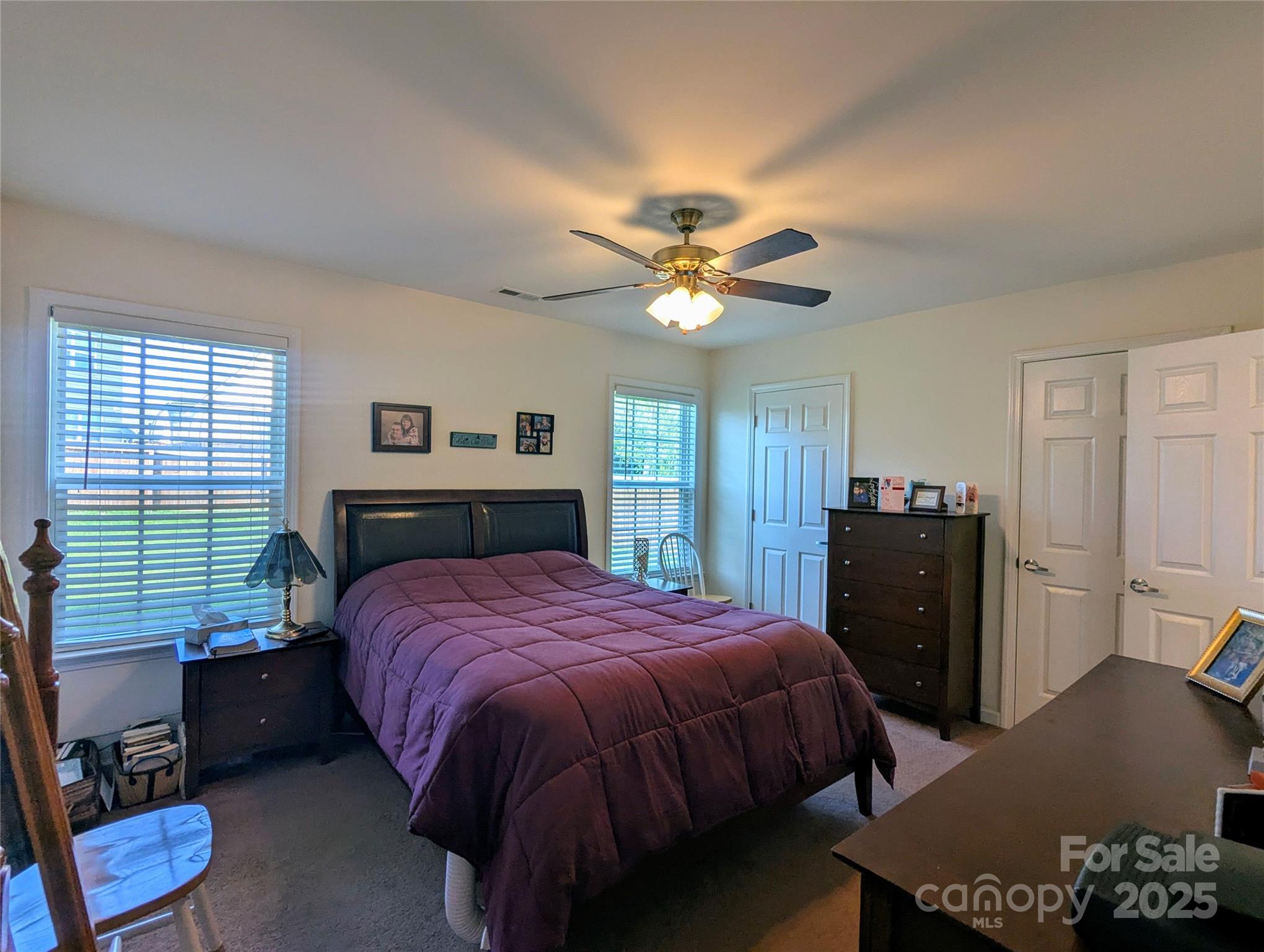 163 West Swift Creek Road Fletcher, NC 28732 - Photo 12 of 26 a bed room with a bed and a window