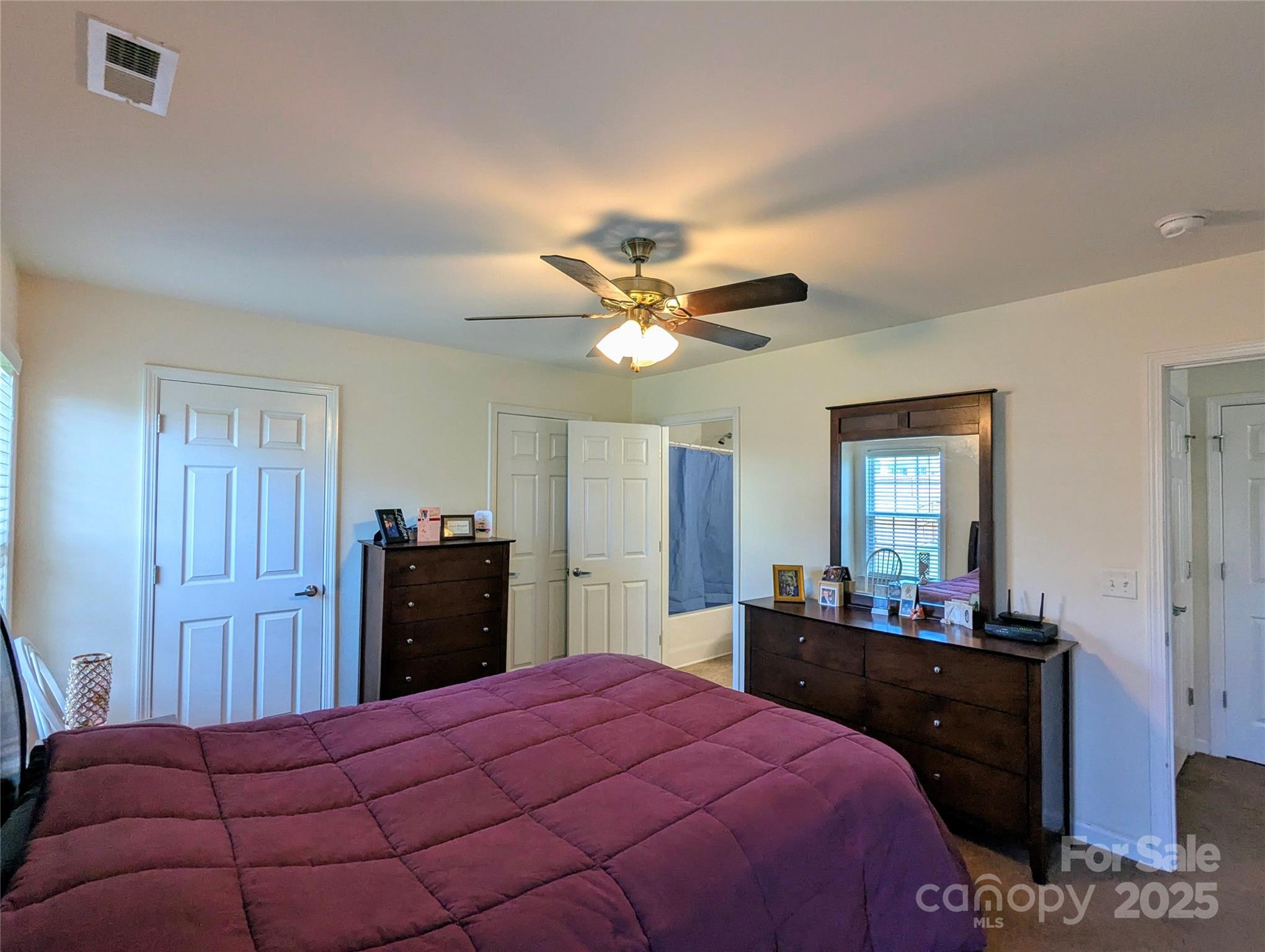 163 West Swift Creek Road Fletcher, NC 28732 - Photo 13 of 26 a bedroom with a bed and a dresser