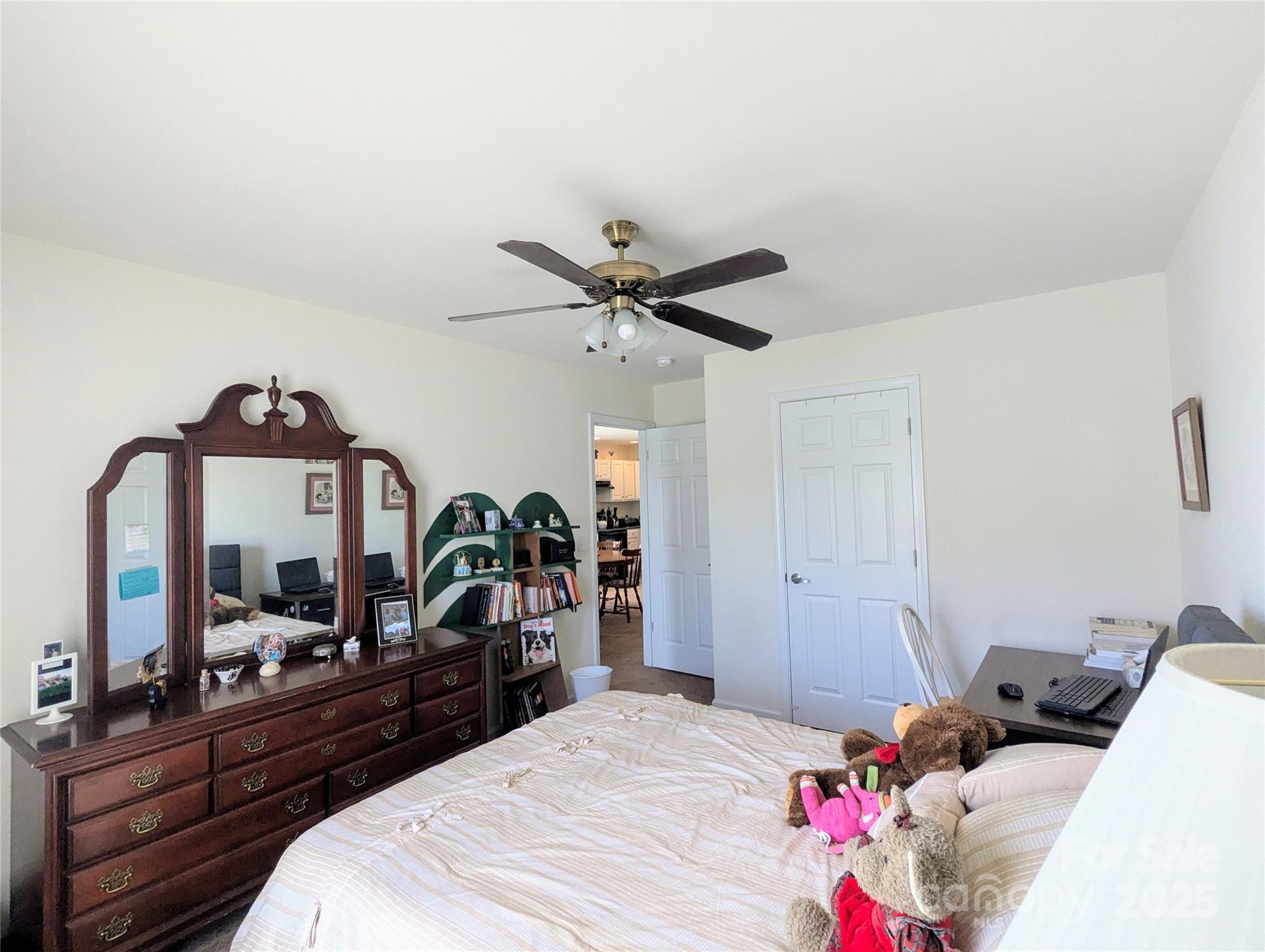 163 West Swift Creek Road Fletcher, NC 28732 - Photo 16 of 26 a bedroom with a bed and a mirror on the dresser