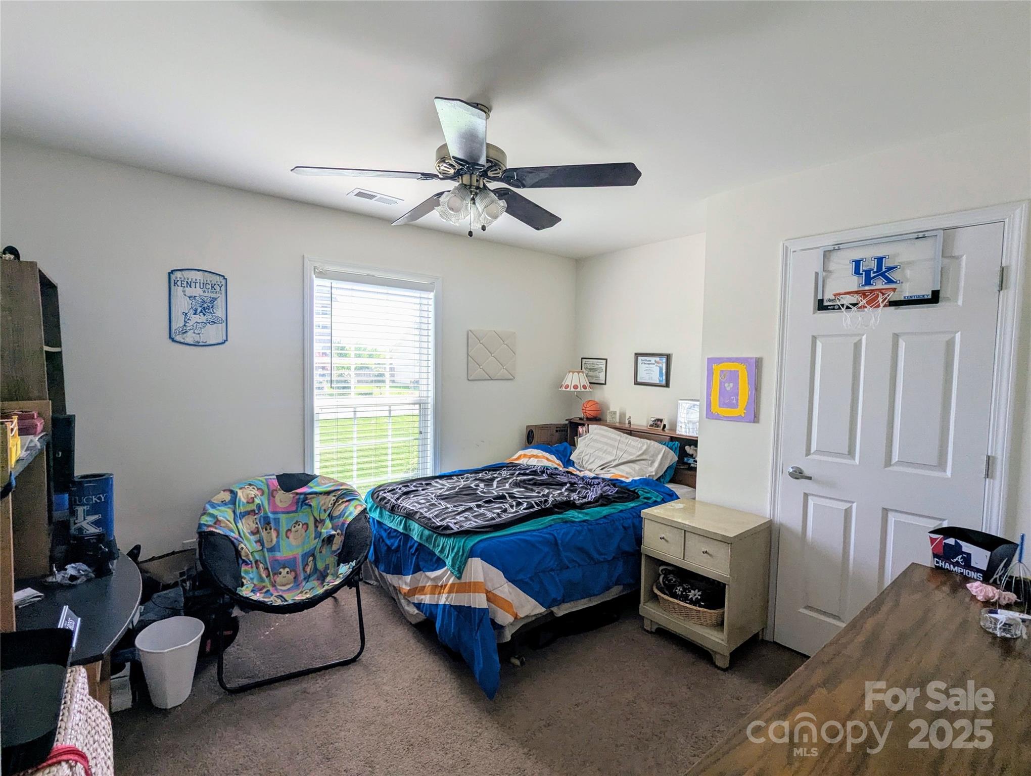 163 West Swift Creek Road Fletcher, NC 28732 - Photo 17 of 26 a bedroom with furniture and a window
