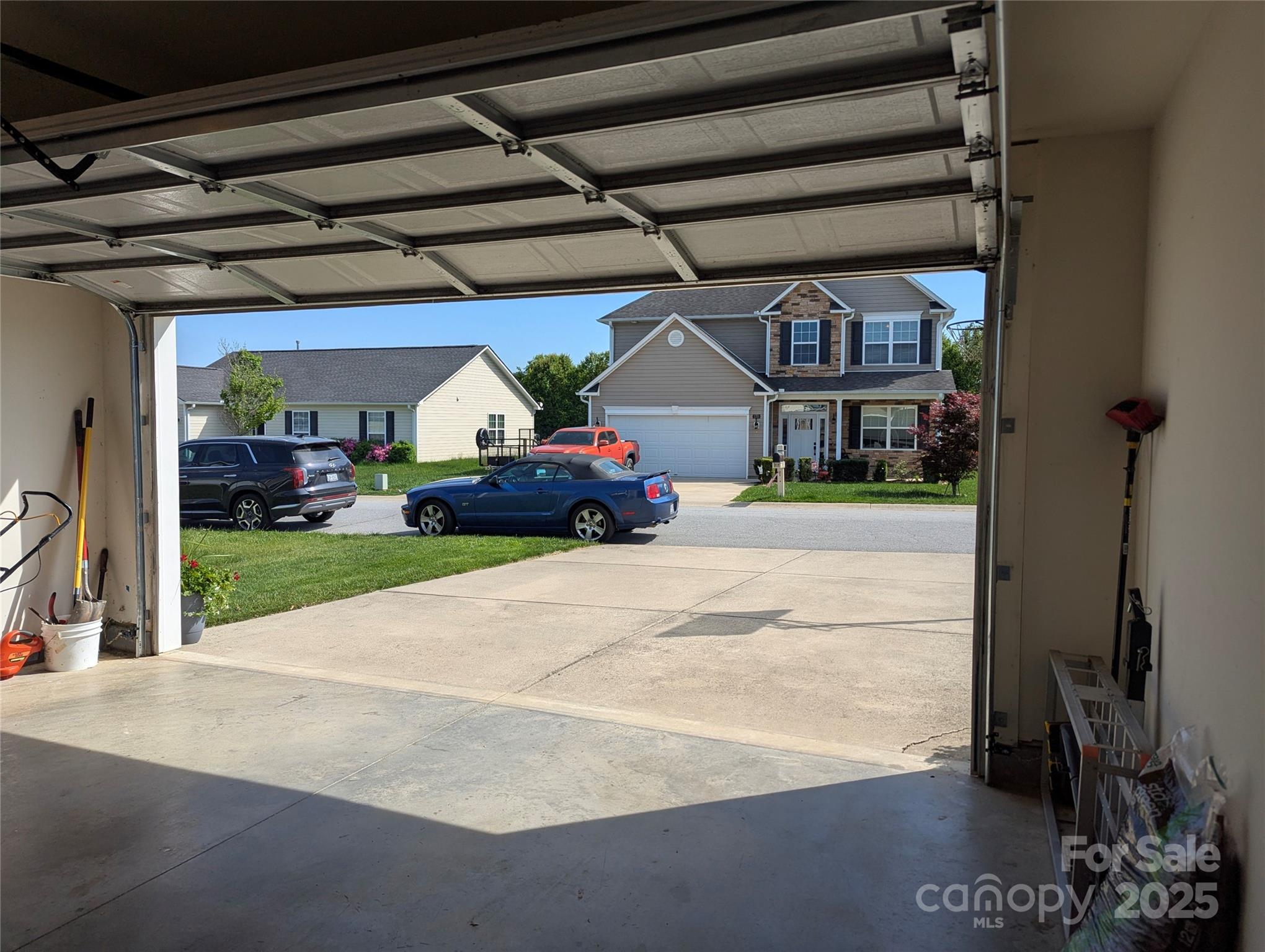 163 West Swift Creek Road Fletcher, NC 28732 - Photo 24 of 26 a view of a house with a porch