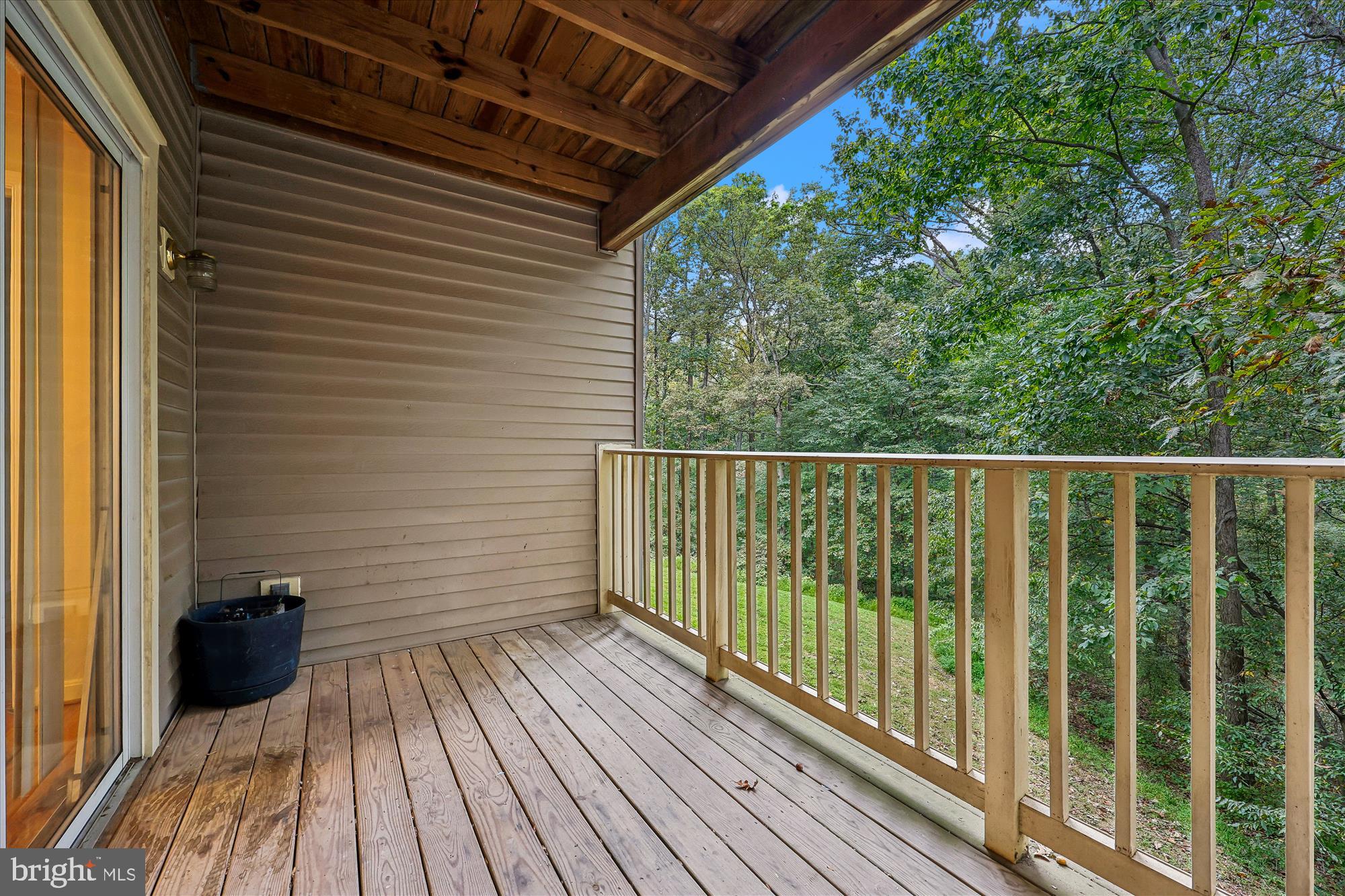 137 Timberbrook Lane, Unit 103 Gaithersburg, MD 20878 - Photo 14 of 51 a view of a balcony with wooden floor
