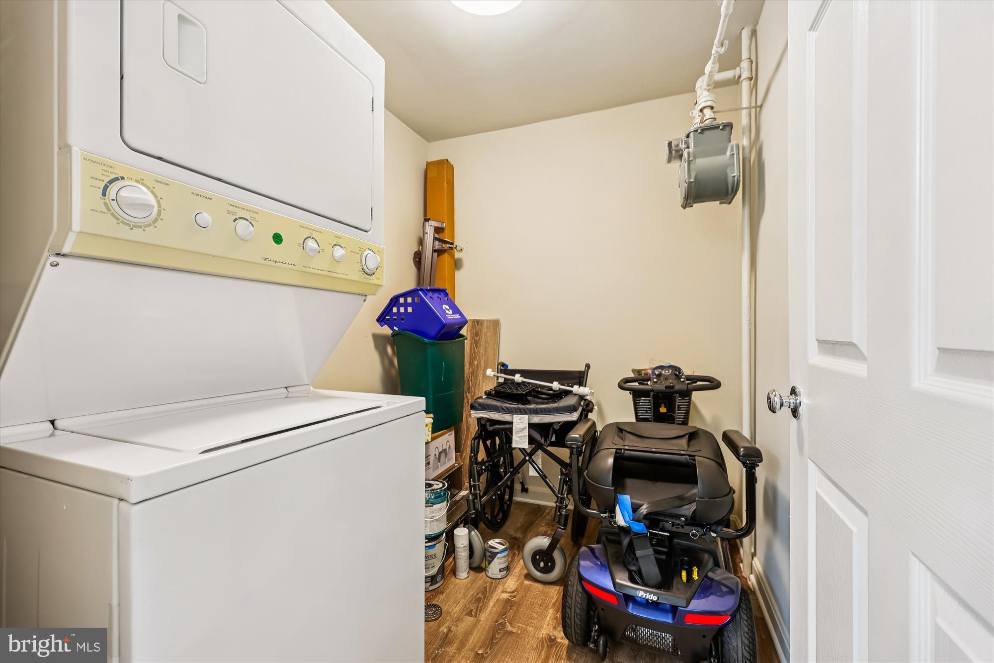 137 Timberbrook Lane, Unit 103 Gaithersburg, MD 20878 - Photo 23 of 51 a view of a storage and utility room with two washing machine