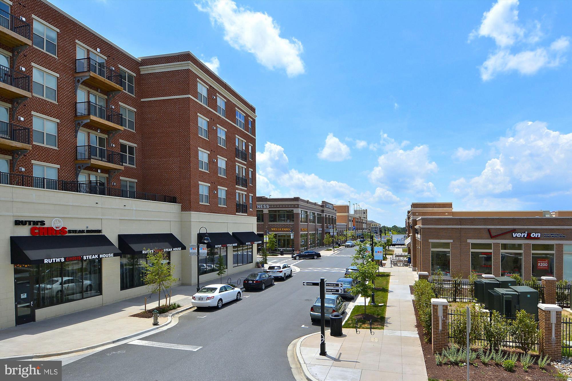 137 Timberbrook Lane, Unit 103 Gaithersburg, MD 20878 - Photo 28 of 51 a view of a building with sitting area
