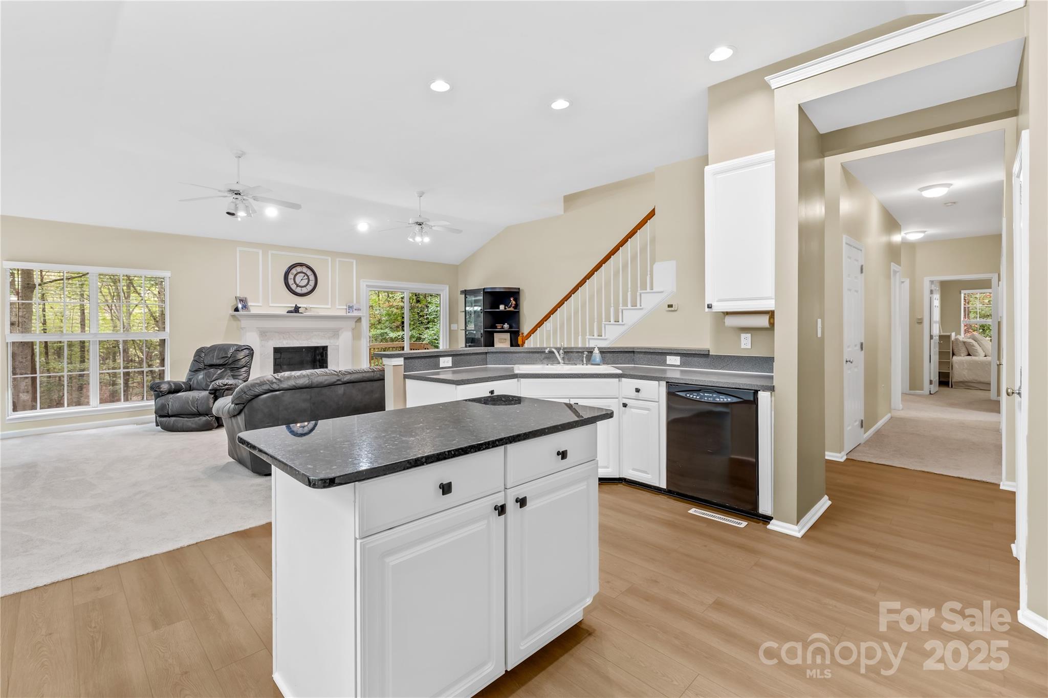 11113 Asbury Chapel Road Huntersville, NC 28078 - Photo 12 of 40 a kitchen with stainless steel appliances granite countertop a sink stove and refrigerator