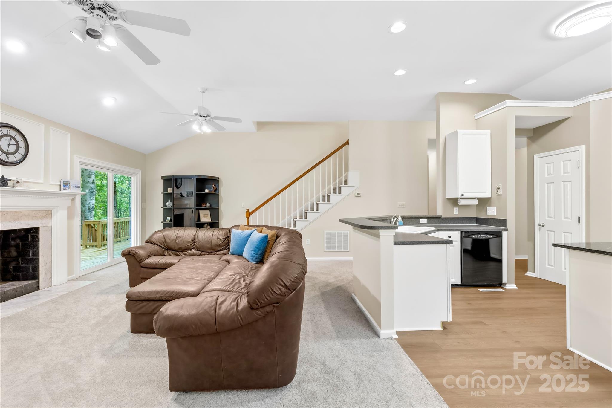 11113 Asbury Chapel Road Huntersville, NC 28078 - Photo 17 of 40 a living room with furniture and a fireplace