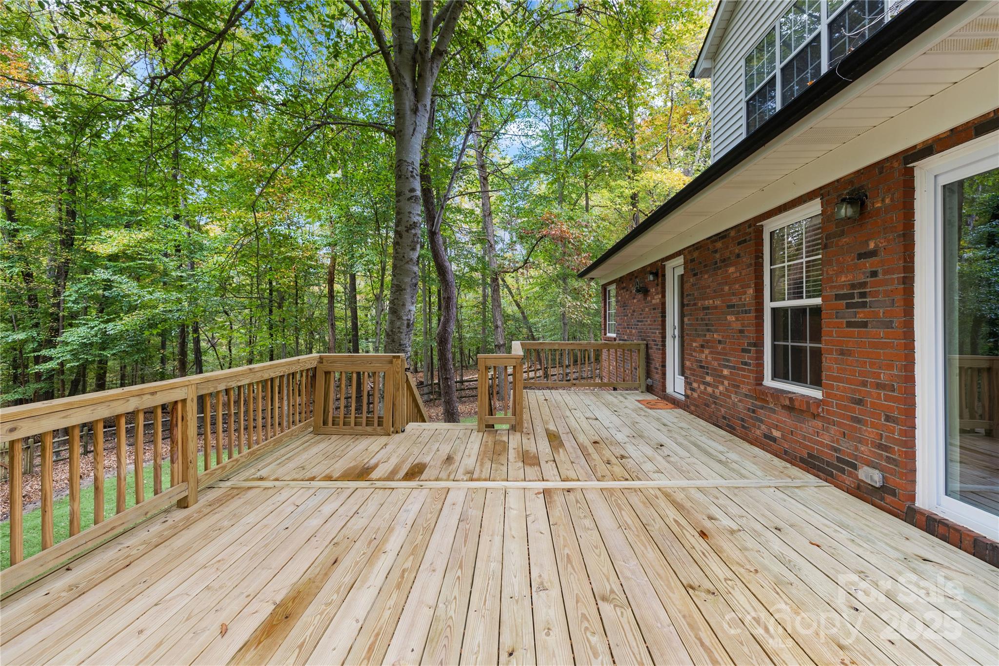 11113 Asbury Chapel Road Huntersville, NC 28078 - Photo 21 of 40 a view of balcony with wooden floor and outdoor space
