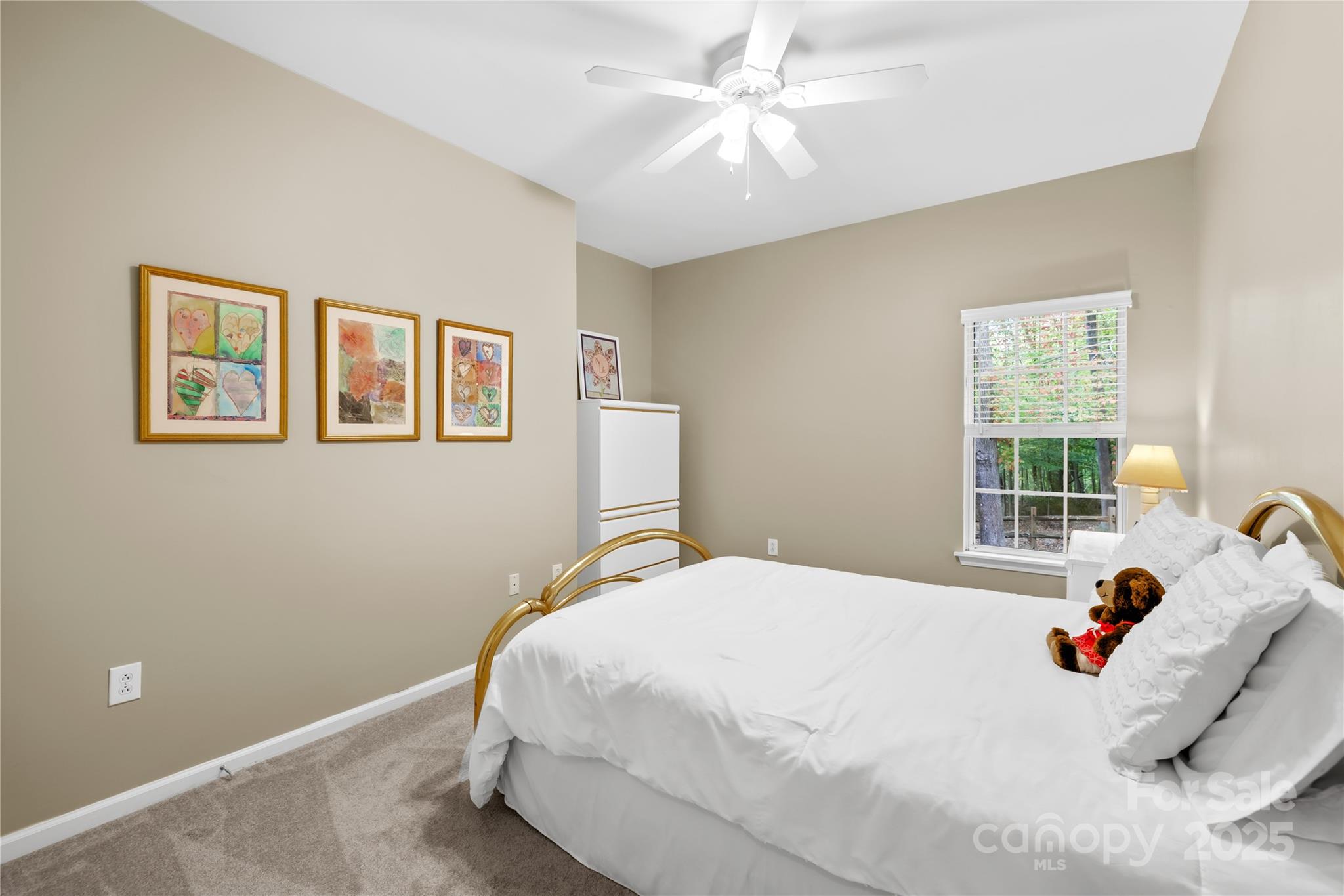 11113 Asbury Chapel Road Huntersville, NC 28078 - Photo 27 of 40 a bedroom with a bed and a window