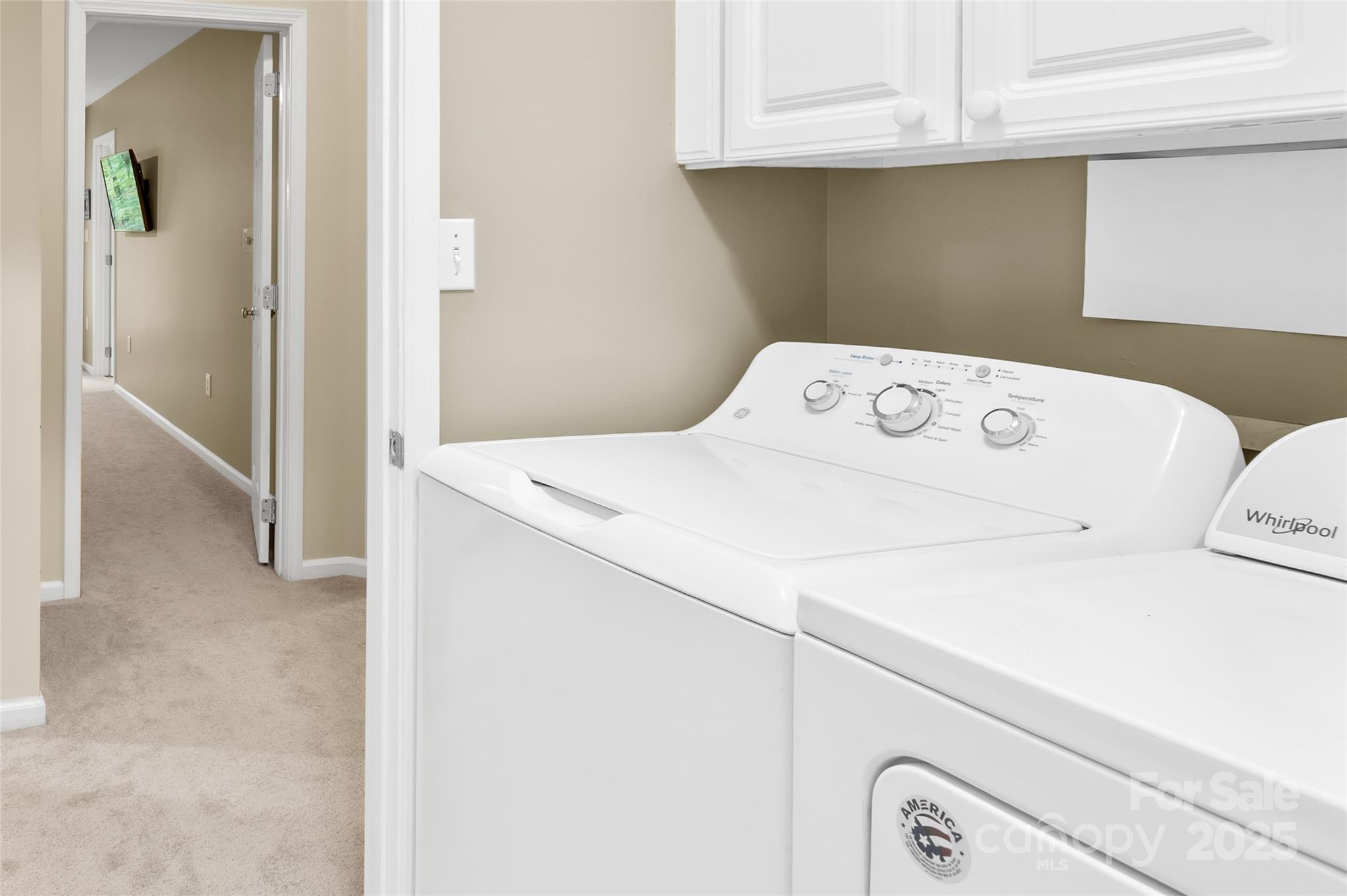 11113 Asbury Chapel Road Huntersville, NC 28078 - Photo 30 of 40 a utility room with dryer and washer