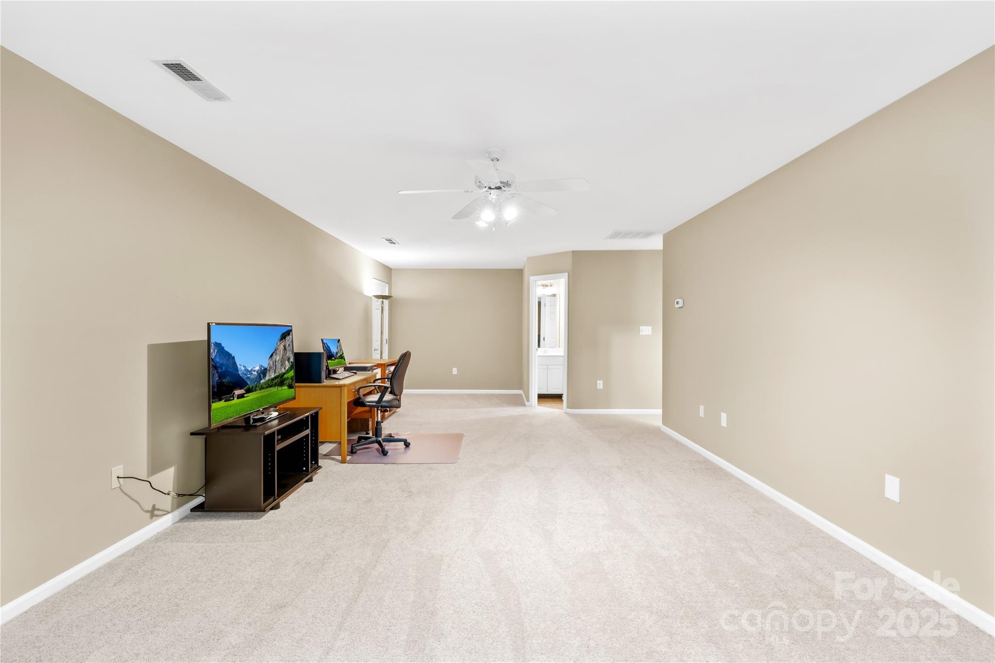 11113 Asbury Chapel Road Huntersville, NC 28078 - Photo 32 of 40 a living room with furniture and a fireplace