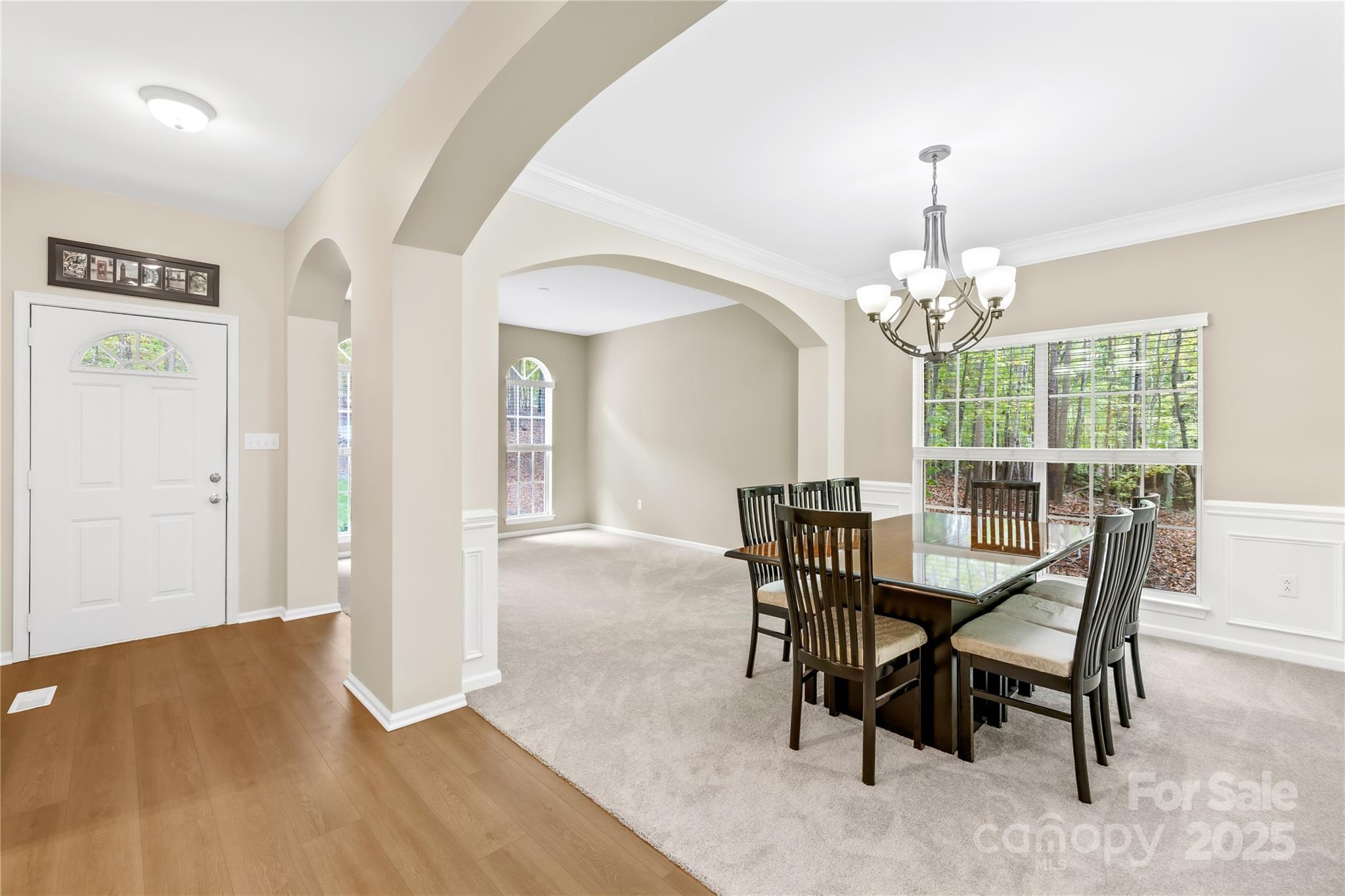 11113 Asbury Chapel Road Huntersville, NC 28078 - Photo 5 of 40 a view of a dining room with furniture and window