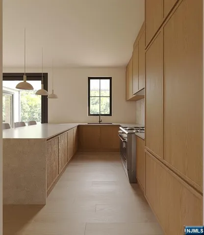 a view of a kitchen with a sink window and a refrigerator