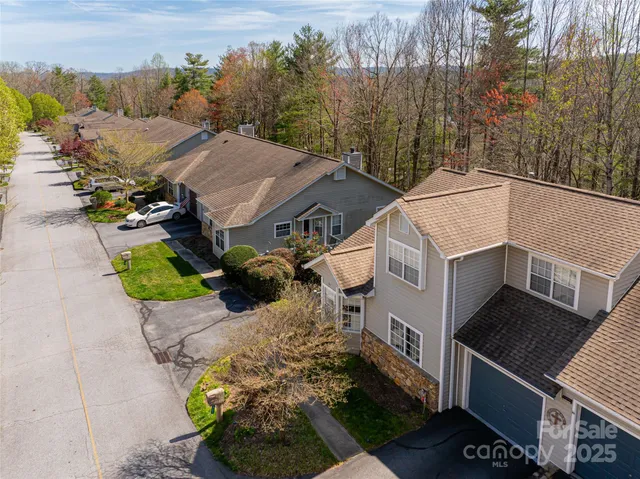 an aerial view of a house with a garden