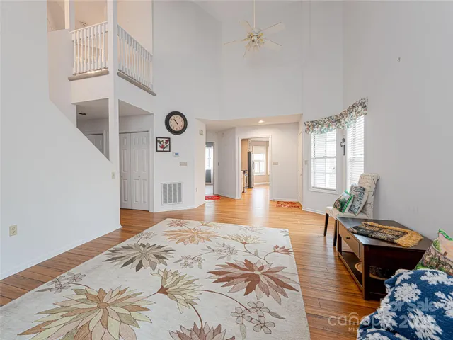a bedroom with bed and window