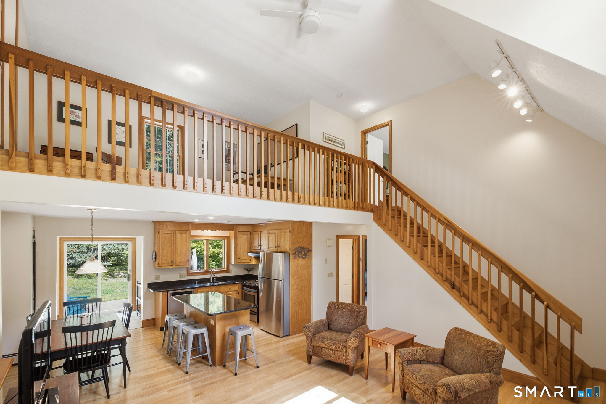 24 Liska Road Willington, CT 06279 - Photo 38 of 40 Cathedral ceiling and windows welcome natural light into this home with open floor plan throughout the day.