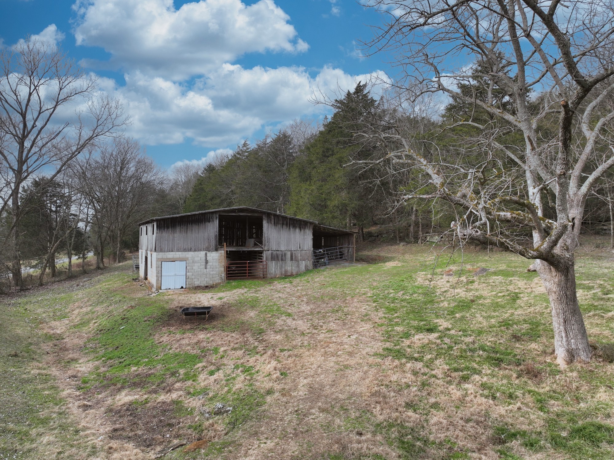 329 Cavender Road Woodbury, TN 37190 - Photo 18 of 41 a view of a house with a yard