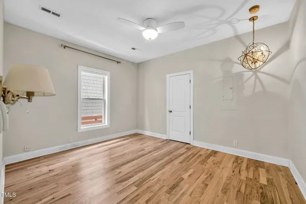 a view of a house with large windows