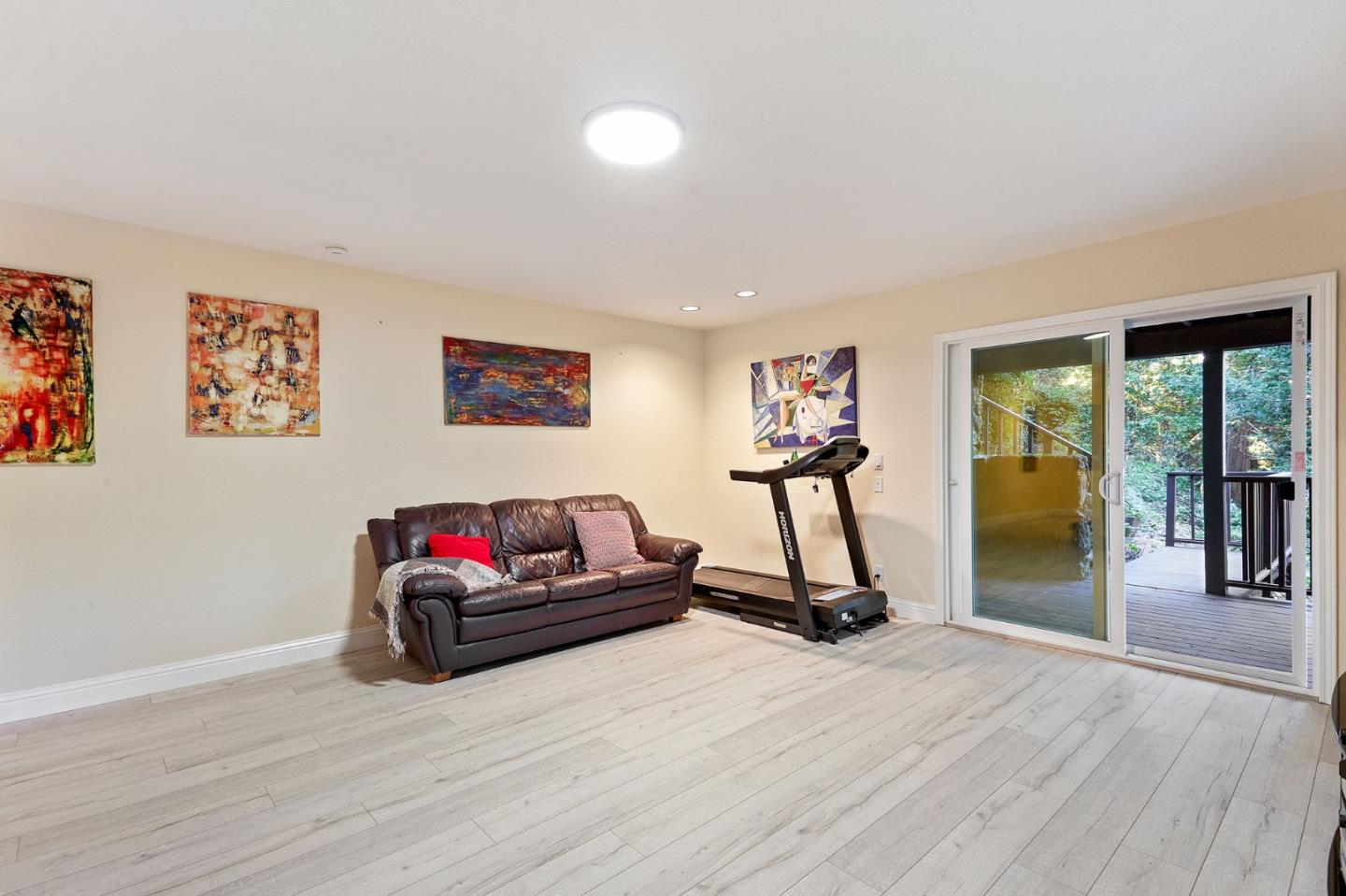 170 Swett Road Woodside, CA 94062 - Photo 25 of 36 a living room with couch tv and a window