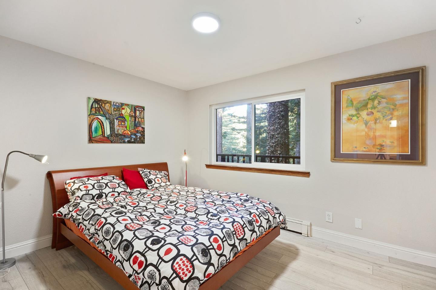 170 Swett Road Woodside, CA 94062 - Photo 27 of 36 a bed sitting in a bedroom next to a window