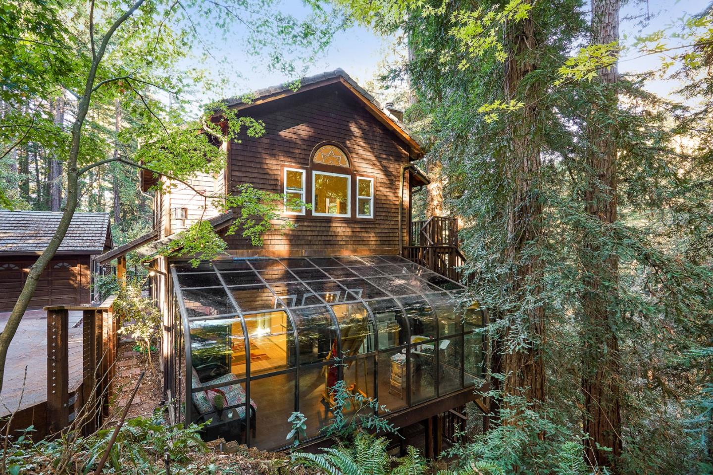 170 Swett Road Woodside, CA 94062 - Photo 3 of 36 a view of a large building with a tree