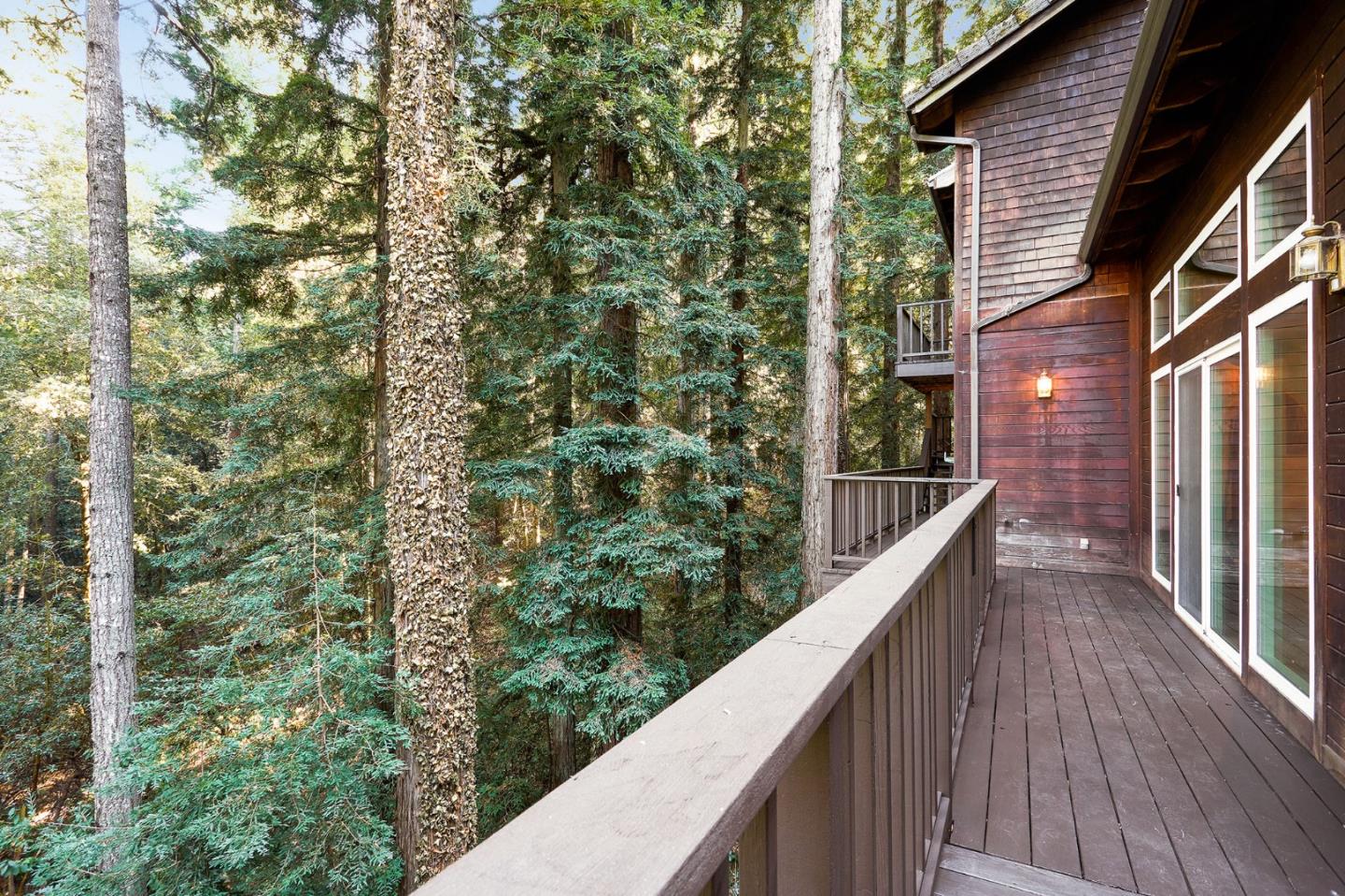 170 Swett Road Woodside, CA 94062 - Photo 33 of 36 a balcony with trees in front of it